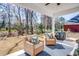 Relaxing outdoor patio features comfortable seating and overlooks the backyard at 474 Wraggs Ferry Rd., Georgetown, SC 29440