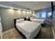 Bedroom with two beds, decorative lighting, and tile flooring at 4800 S Ocean Blvd. # 1514, North Myrtle Beach, SC 29582