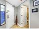 Entryway with decorative vase and view into adjacent bathroom at 4800 S Ocean Blvd. # 1514, North Myrtle Beach, SC 29582