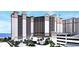 Beautiful condo exterior showing the building and landscaping at 4800 S Ocean Blvd. # 1514, North Myrtle Beach, SC 29582
