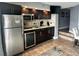 Well-equipped kitchen featuring stainless steel appliances, granite countertops, and tile backsplash at 4800 S Ocean Blvd. # 1514, North Myrtle Beach, SC 29582