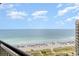 Breathtaking ocean view from a high-rise balcony with wide sandy beach perfect for relaxation and beach activities at 4800 S Ocean Blvd. # 1514, North Myrtle Beach, SC 29582