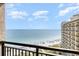 Breathtaking ocean view from a high-rise balcony with wide sandy beach perfect for relaxation and beach activities at 4800 S Ocean Blvd. # 1514, North Myrtle Beach, SC 29582