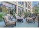 Relax on this open-air patio, furnished with cushioned chairs and a center table, perfect for conversations at 4800 S Ocean Blvd. # 1514, North Myrtle Beach, SC 29582