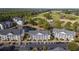 Close aerial view of modern condo buildings and parking areas at 5060 Windsor Green Way # 304, Myrtle Beach, SC 29579