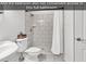 Bright bathroom with tiled stand up shower and modern sink at 52 Olde Canal Loop, Pawleys Island, SC 29585