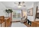 Charming Bedroom with crib, armchair, ceiling fan, and natural light from the window at 52 Olde Canal Loop, Pawleys Island, SC 29585