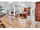 Bright dining area connecting to a modern kitchen with an open-concept layout at 52 Olde Canal Loop, Pawleys Island, SC 29585