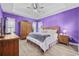 Bright bedroom featuring wood furniture, ceiling fan, and light wood-look flooring at 521 Harbison Circle, Myrtle Beach, SC 29579