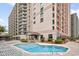 Beautiful pool and lounge area with resort building in the background at 5308 N Ocean Blvd. # 2108, Myrtle Beach, SC 29577