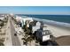 An aerial view of the beach homes and coastline at 547 South Waccamaw Dr., Garden City Beach, SC 29576