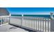 Spacious balcony with ocean views, perfect for outdoor relaxation at 547 South Waccamaw Dr., Garden City Beach, SC 29576