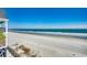 Expansive beach view, perfect for relaxation and enjoying the scenic coastline at 547 South Waccamaw Dr., Garden City Beach, SC 29576