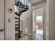 Hallway with spiral staircase leading to another level and bathroom at 547 South Waccamaw Dr., Garden City Beach, SC 29576