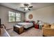 Comfortable bedroom with large window providing natural light at 583 Meadowgrass Ct., Myrtle Beach, SC 29588