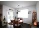 Dining room with modern lighting and sliding doors at 583 Meadowgrass Ct., Myrtle Beach, SC 29588