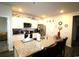 Bright kitchen featuring white cabinets, stainless steel appliances, and granite countertops at 583 Meadowgrass Ct., Myrtle Beach, SC 29588