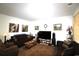 Comfortable living room with neutral walls, dark furnishings, and patterned rug at 583 Meadowgrass Ct., Myrtle Beach, SC 29588