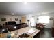 Open floor plan with granite counters, stainless sink, and modern dining area adjacent to the living room at 583 Meadowgrass Ct., Myrtle Beach, SC 29588