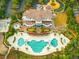 Breathtaking aerial view of the community clubhouse, highlighting the multiple pools and manicured grounds at 8155 Living Tide Dr., Myrtle Beach, SC 29572