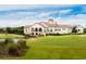 Elegant clubhouse overlooking a lush golf course, offering a picturesque setting at 8155 Living Tide Dr., Myrtle Beach, SC 29572