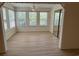 Well-lit room with 3 large windows, laminate floors and closet at 8545 Hopkins Circle # G, Myrtle Beach, SC 29575