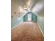 Finished attic features plush carpeting, dormer window with curtain and custom paint at 920 Leather Leaf Ln., Longs, SC 29568