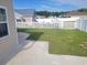 Nice backyard featuring a well-maintained lawn and a white picket fence at 920 Leather Leaf Ln., Longs, SC 29568