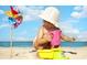 A toddler plays with beach toys on a sunny day at 920 Leather Leaf Ln., Longs, SC 29568