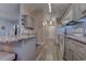 Galley kitchen featuring granite countertops, white appliances, and white subway tile backsplash at 920 Leather Leaf Ln., Longs, SC 29568