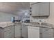 Bright kitchen with granite countertops, subway tile backsplash, and stainless steel sink at 920 Leather Leaf Ln., Longs, SC 29568