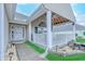 Inviting covered porch, perfect for relaxing and enjoying the outdoors at 920 Leather Leaf Ln., Longs, SC 29568