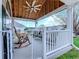 Cozy covered porch with rocking chair and seating at 920 Leather Leaf Ln., Longs, SC 29568
