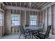 Unfinished sunroom with natural light, with potential for creating an inviting space for relaxation at 920 Leather Leaf Ln., Longs, SC 29568