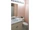 Well-lit bathroom with white vanity and marble countertop at 960 South Farr Ave., Andrews, SC 29510