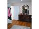 Bright dressing room with hardwood floors and open closet at 960 South Farr Ave., Andrews, SC 29510