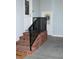 Brick steps with black handrail leading to a welcoming entryway at 960 South Farr Ave., Andrews, SC 29510