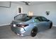 Spacious garage featuring car, neutral walls, and an entryway to the home's interior at 960 South Farr Ave., Andrews, SC 29510