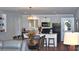 Bright kitchen and dining area featuring modern appliances and an island with bar stool seating at 960 South Farr Ave., Andrews, SC 29510