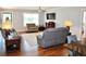 Comfortable living room with hardwood floors, a ceiling fan, and neutral-colored furniture at 960 South Farr Ave., Andrews, SC 29510