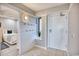 Functional entryway with coat hooks, tile flooring, and a view into a bedroom at 101 Ocean Creek Dr. # Jj-1, Myrtle Beach, SC 29572