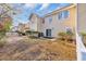 Backyard with a lawn and a fence, partially covered in brown leaves at 1040 Fairway Ln. # 1040, Conway, SC 29526