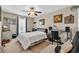 Bedroom with a ceiling fan and musical instruments at 1040 Fairway Ln. # 1040, Conway, SC 29526