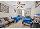 Cozy bedroom featuring two twin beds, decorative wall art, and a ceiling fan at 1040 Fairway Ln. # 1040, Conway, SC 29526