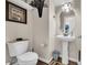 Powder room with pedestal sink and decorative accents at 1040 Fairway Ln. # 1040, Conway, SC 29526