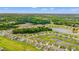 Community aerial view featuring homes, ponds, and lush green landscaping providing a serene backdrop at 1109 Donald St., Conway, SC 29527