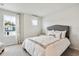 This bedroom features a large window and neutral decor at 1148 Blueback Herring Way # 146, Conway, SC 29526