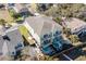 Aerial shot of a two-story beach home with private pools, a patio, and lush landscaping in a desirable location at 124 B Vista Dr., Murrells Inlet, SC 29576