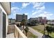 A lovely street view of a home in a coastal neighborhood with palm trees and other beach homes at 124 B Vista Dr., Murrells Inlet, SC 29576