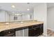 Kitchen counter featuring granite countertops and stainless steel dishwasher at 125 South Shore Blvd. # 201, Longs, SC 29568